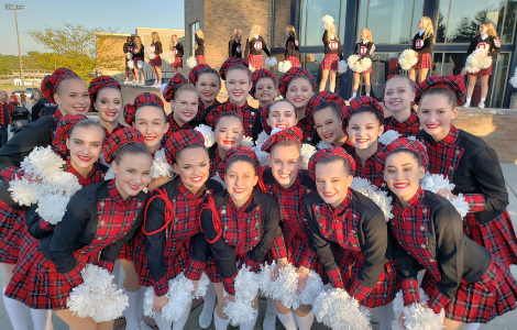 Oakettes in uniform with pompoms